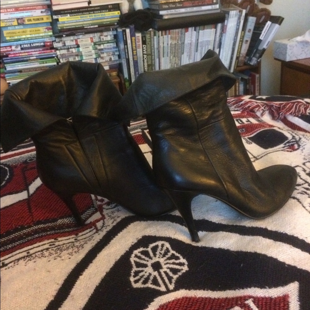 Black leather boots. Never worn.